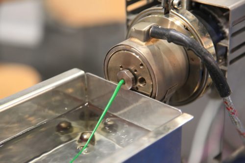 Extruder extruding plastic
