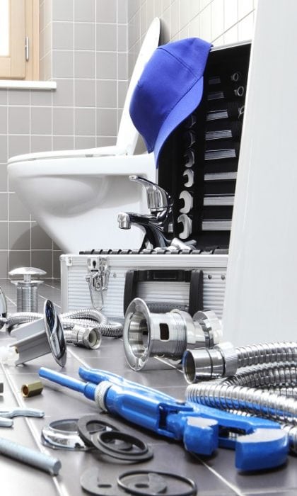 plumber tools and equipment in a bathroom, plumbing repair service, assemble and install concept